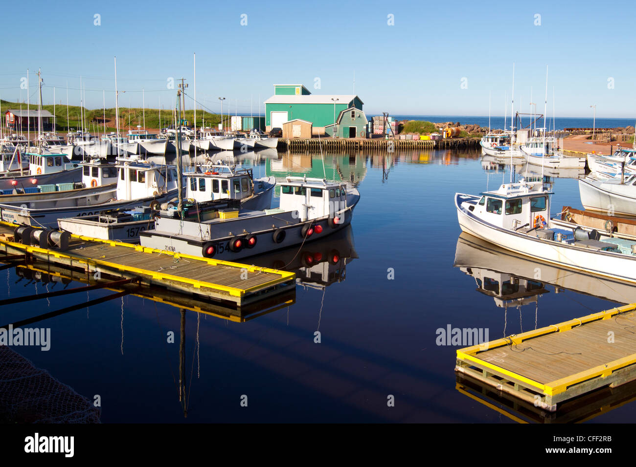Fishing boats tied up at wharf, Seacow Pond, Prince Edward Island, Canada Stock Photo