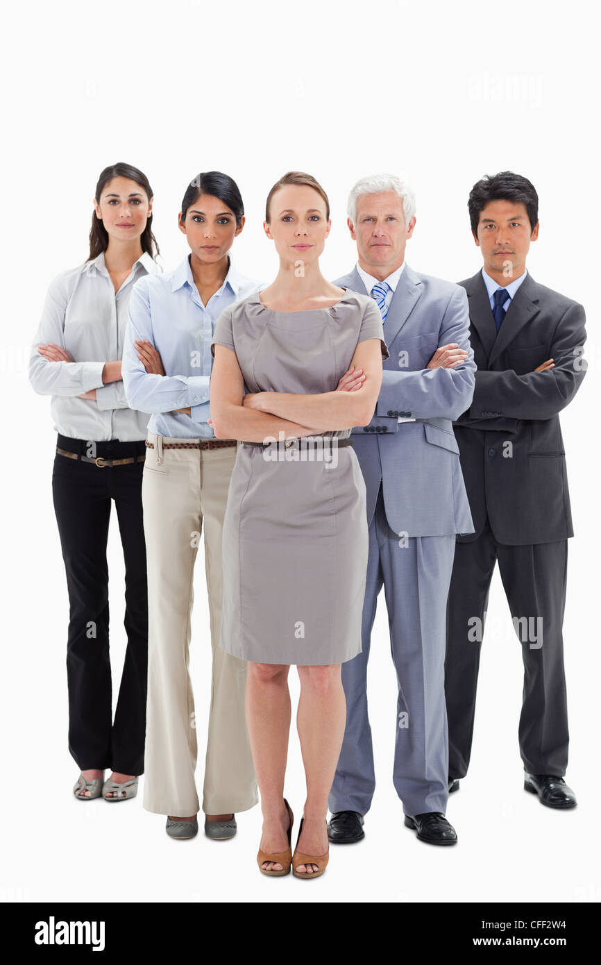 Close-up of a serious business team with their arms folded Stock Photo
