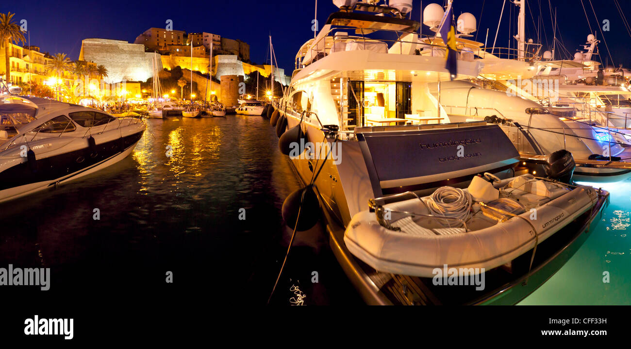 Expensive yachts in the harbor, Calvi, Corsica, France Stock Photo
