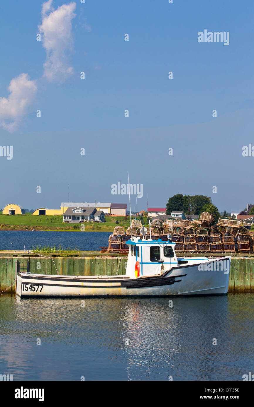 Fishing boats tied up at wharf, Fortune Bay Harbour, Prince Edward Island, Canada Stock Photo