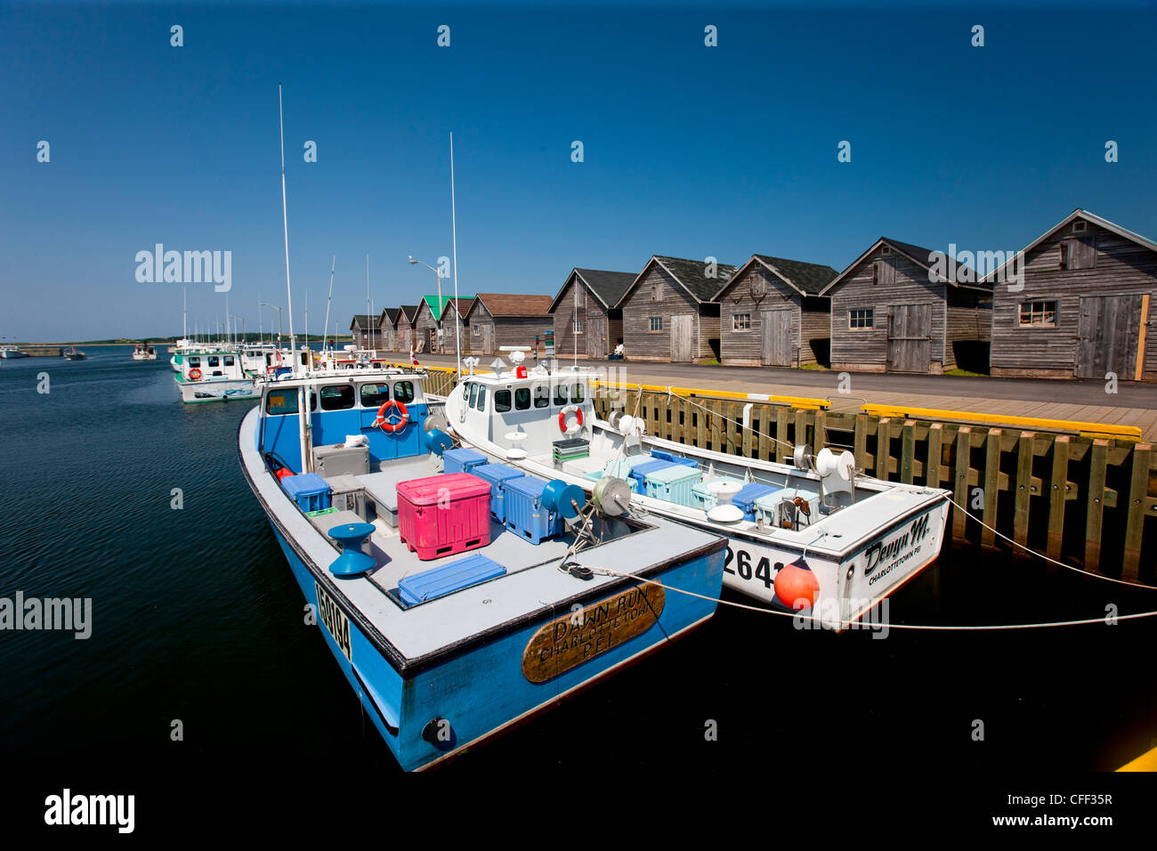 Fishing boats tied up at wharf, Red Point, Prince Edward Island, Canada Stock Photo
