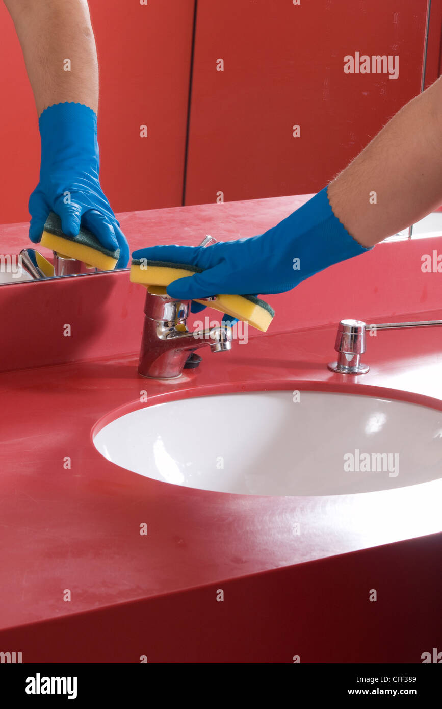 Cleaning Bathroom Sink Stock Photo Alamy