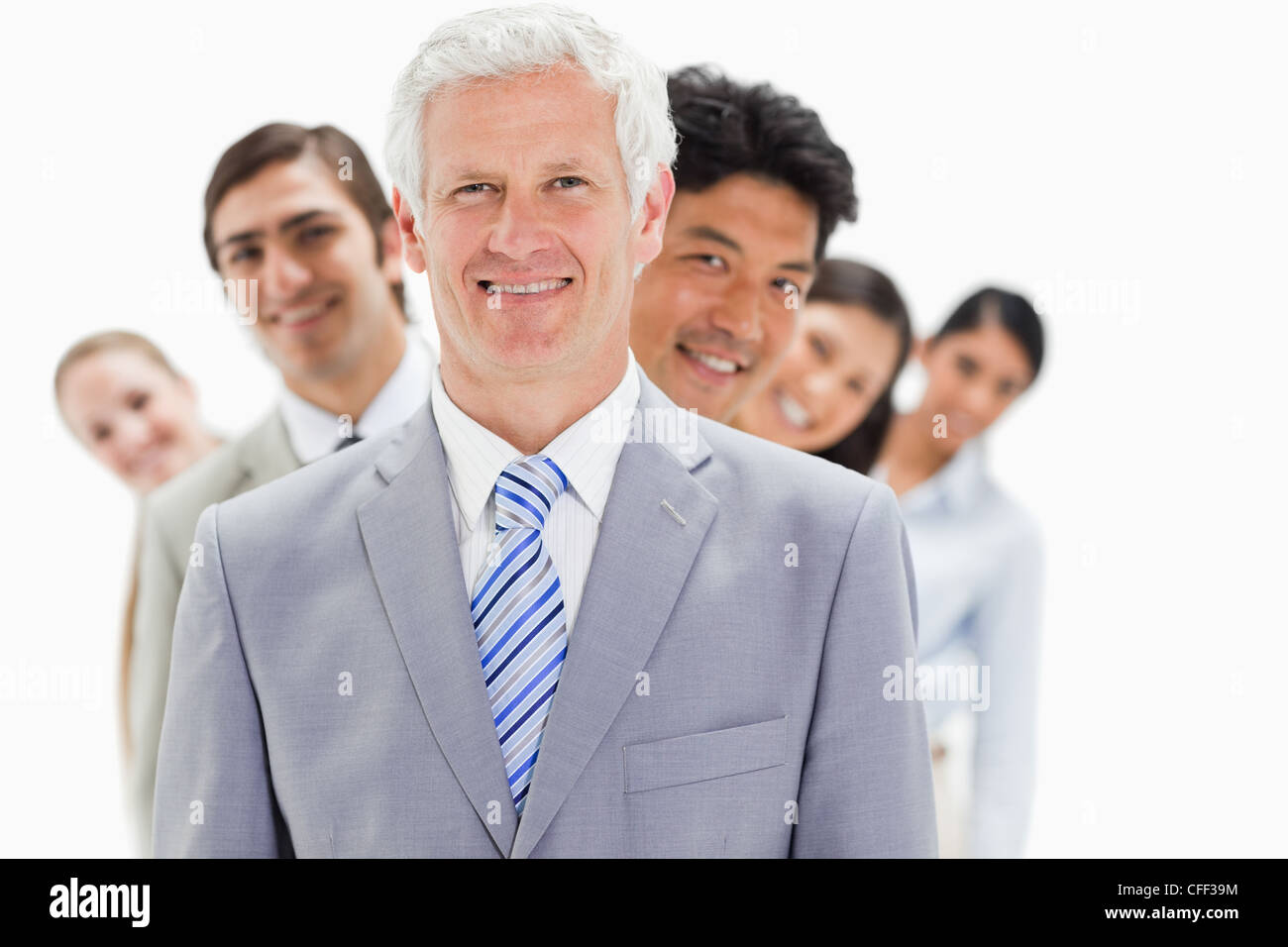 Business people smiling in a single line Stock Photo - Alamy