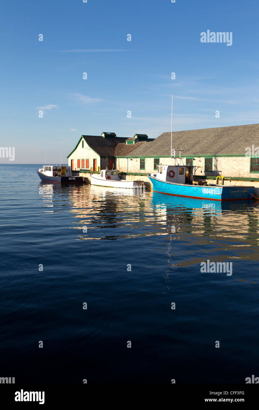Fishing boats tied up at wharf, Victoria, Prince Edward Island, Canada Stock Photo