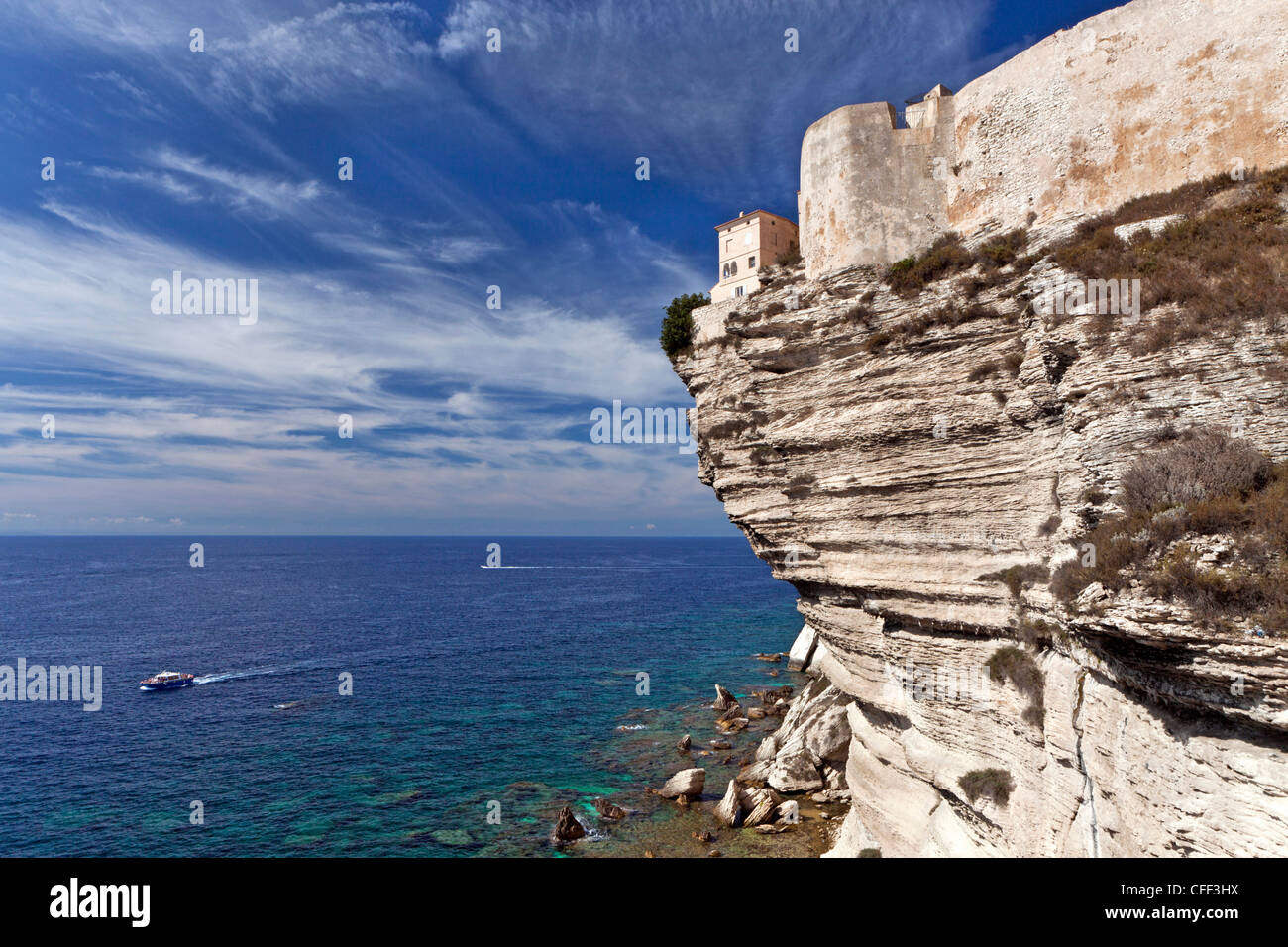 Steep coast with a house, Bonifacio, Oberstadt uand the Mediterranean Sea, Corsica, France Stock Photo