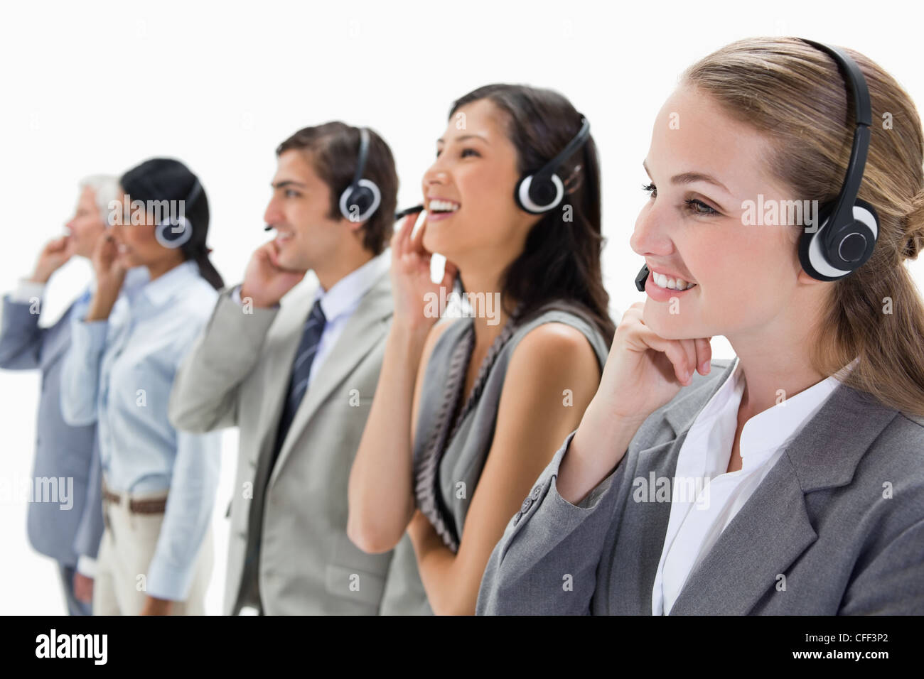 Professionals listening with headsets Stock Photo