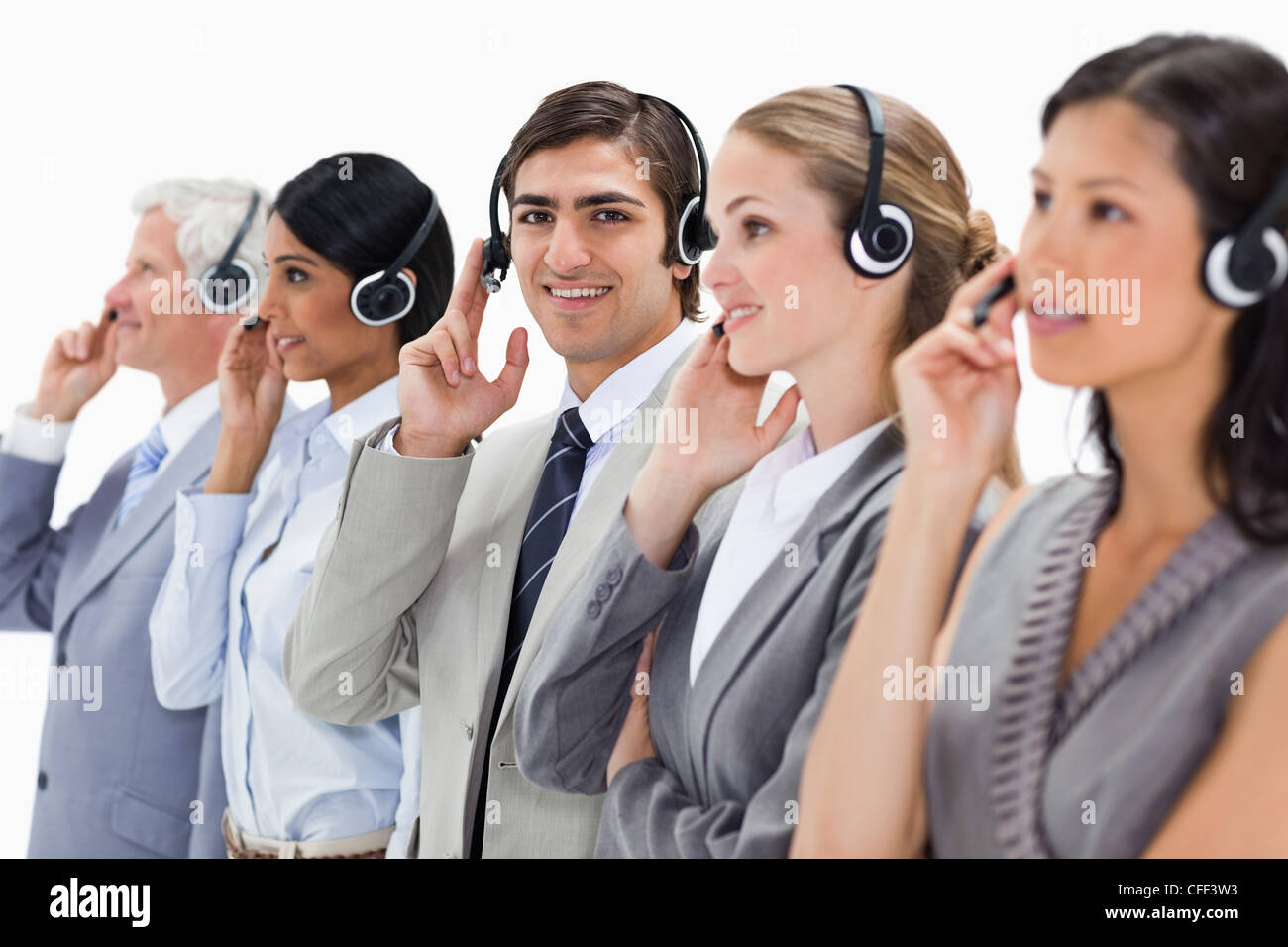 Close-up of professionals in suits listening Stock Photo