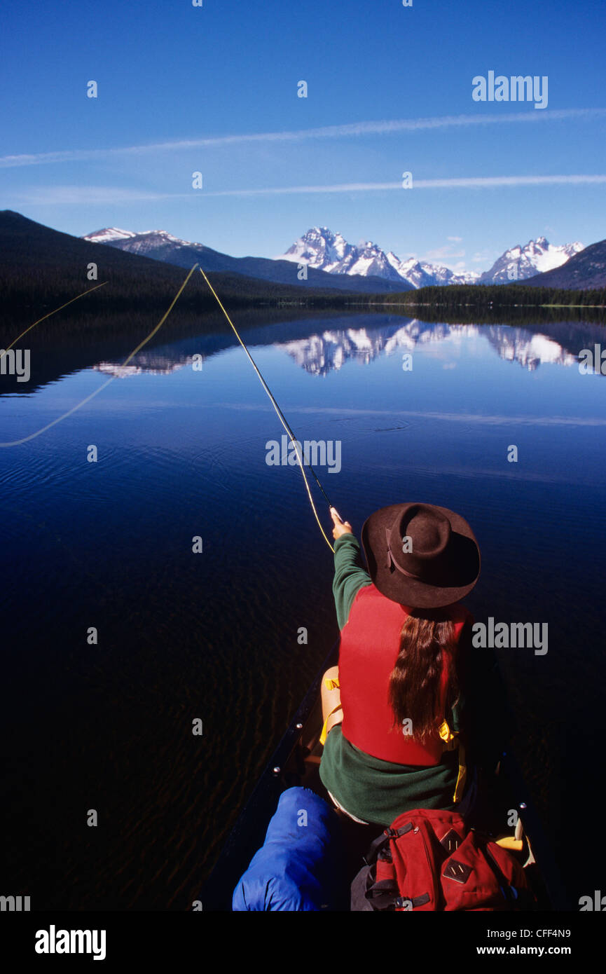Fishing from canoe on Turner Lakes, Tweedsmuir Park, Chilcotin region