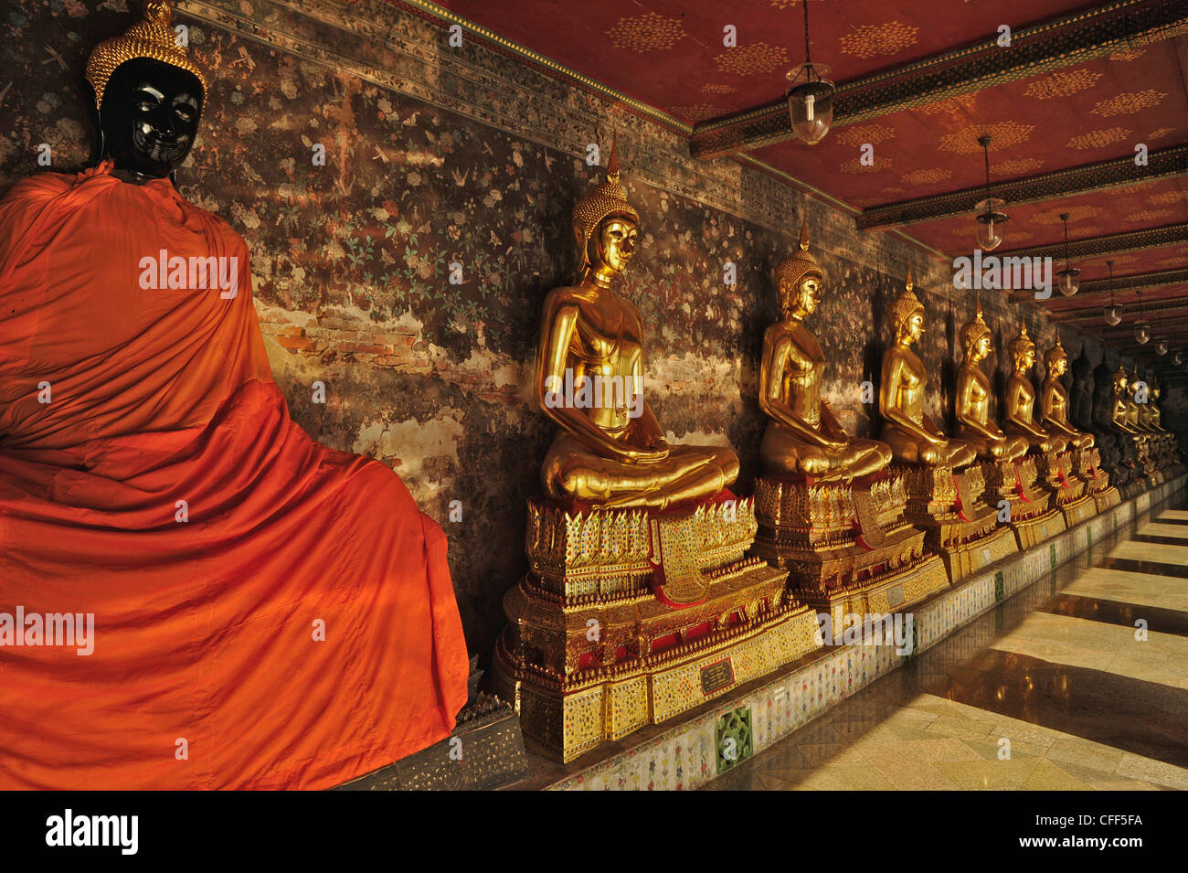 Buddha statues in the gallery, Wat Suthat, Bangkok, Thailand, Asia Stock Photo