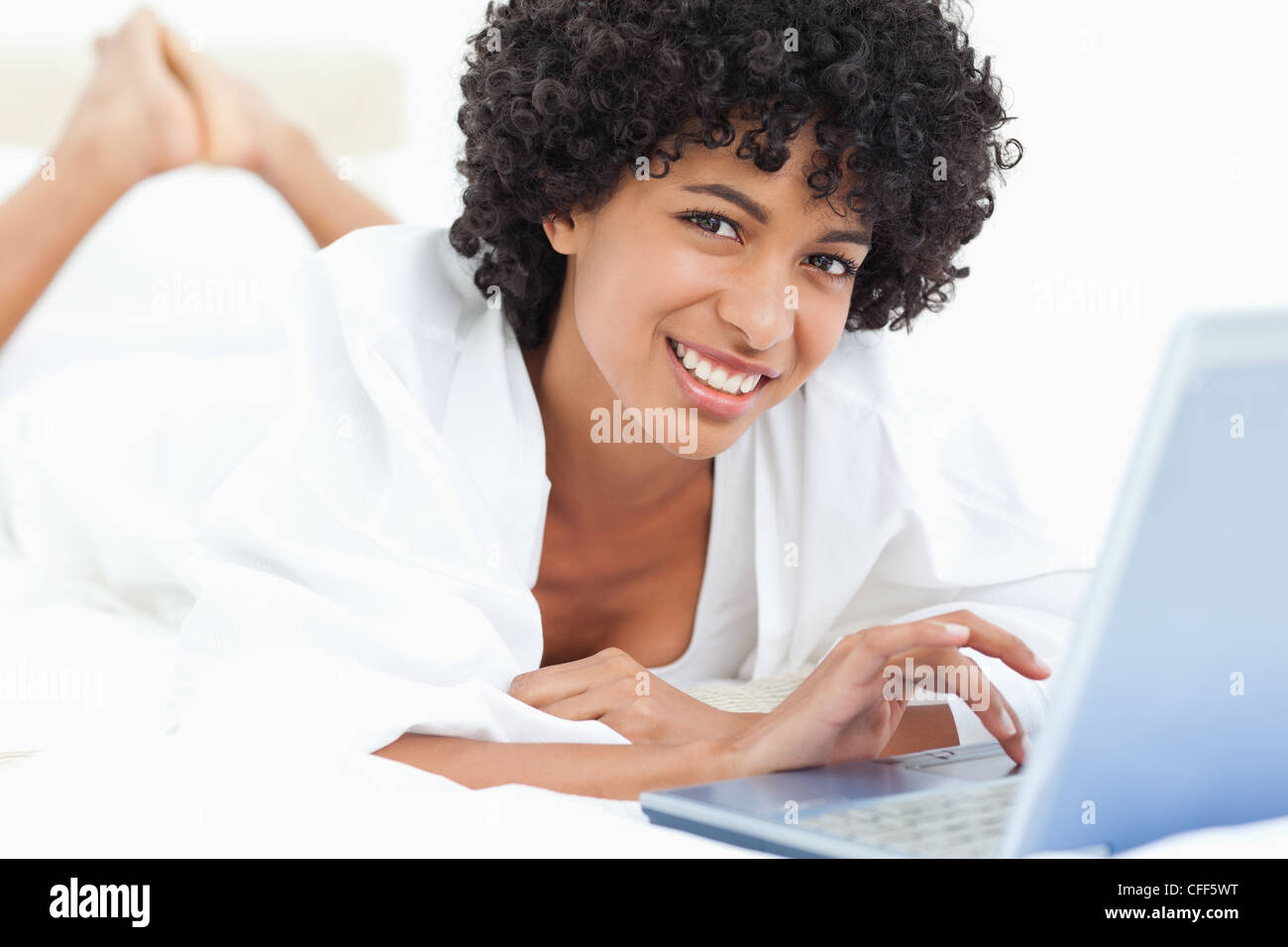 Portrait of a cute woman using a laptop Stock Photo - Alamy