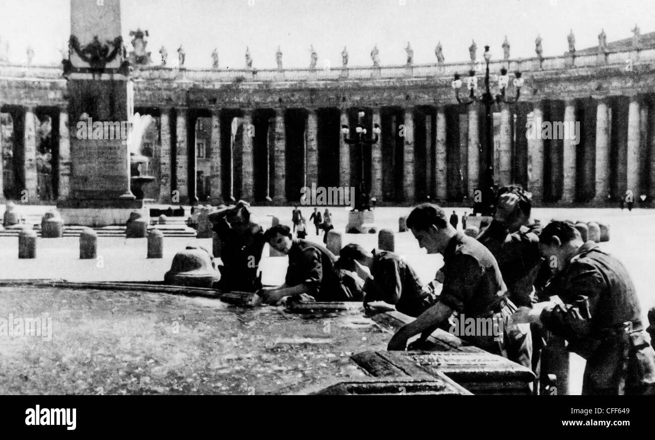 German troops drink at the fountain in St. Peter's,Rome,World War II,1944 Stock Photo