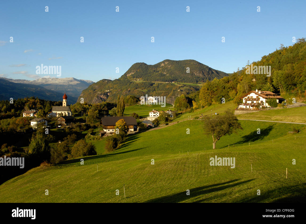 Farmhouses at Villanderer Alp in the sunlight, Kastelruth, Valle Isarco, South Tyrol, Italy, Europe Stock Photo