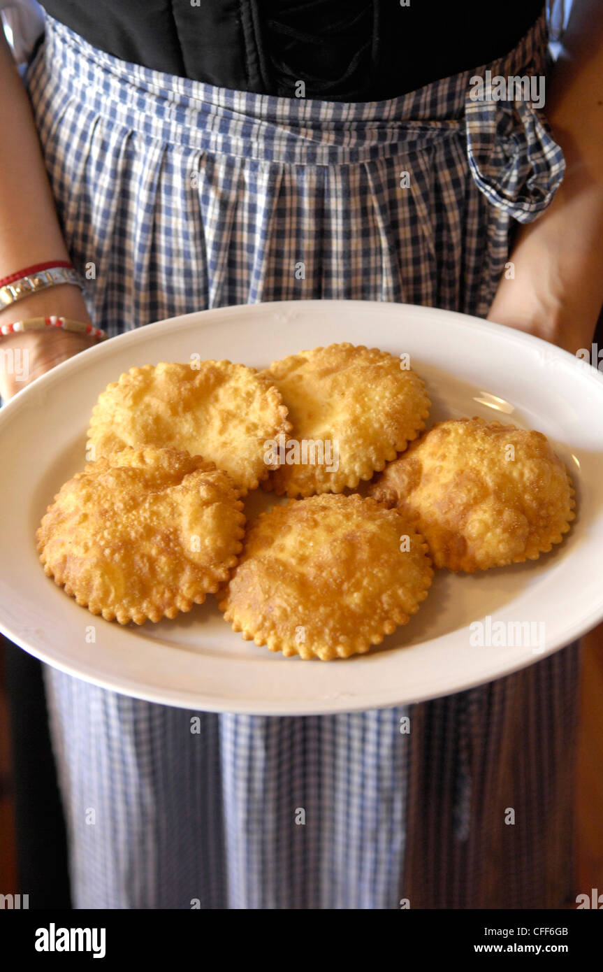 Pasties on a plate in a restaurant, Brunico, Val Pusteria, Alto Adige, South Tyrol, Italy, Europe Stock Photo
