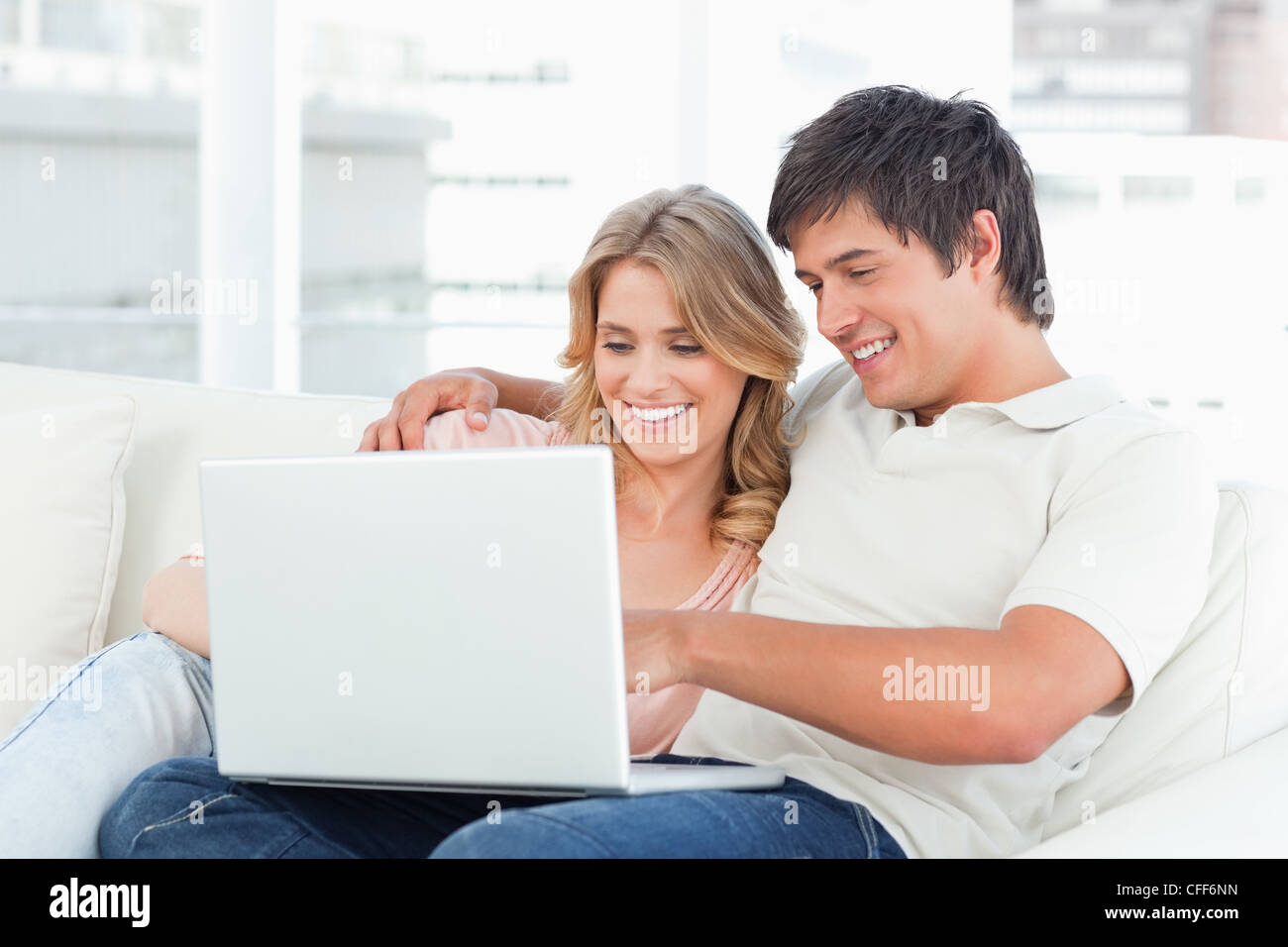 Woman sitting on man lap hi-res stock photography and images - Alamy