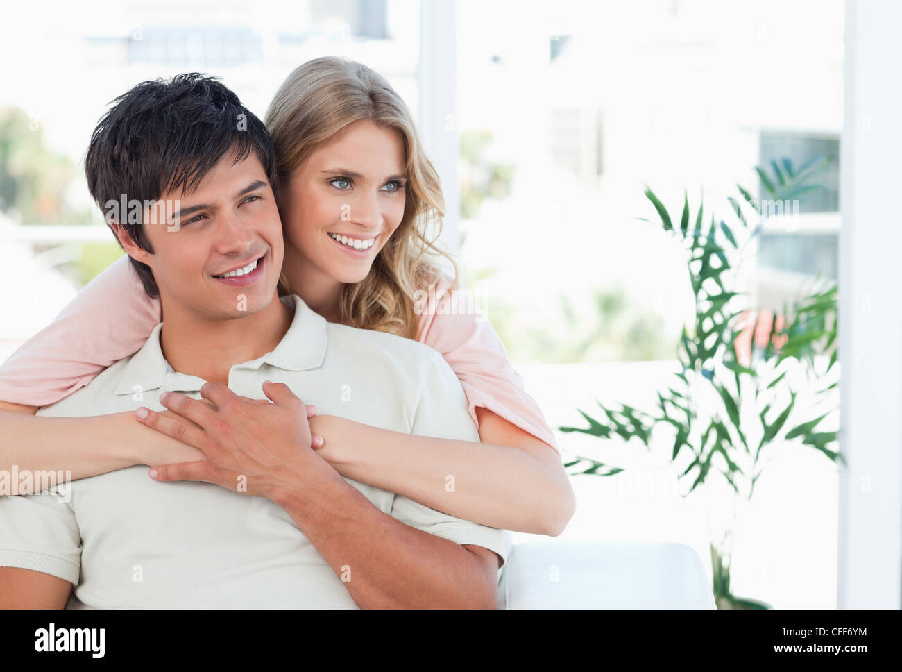 Man woman smile holding hands hi-res stock photography and images - Alamy