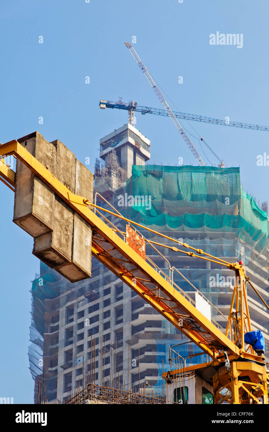 portrait of building developments and lifting cranes fill Mumbai skyline Stock Photo