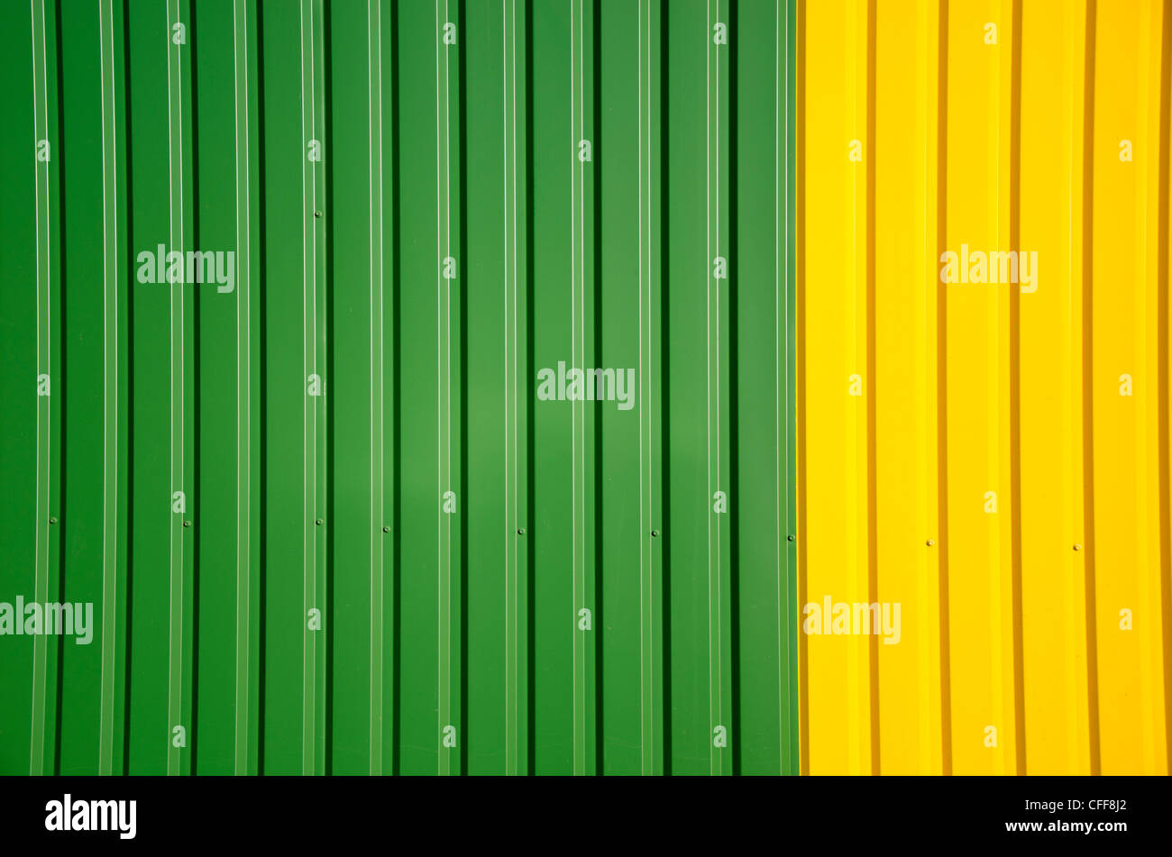 metallic painted green and yellow wall background Stock Photo - Alamy