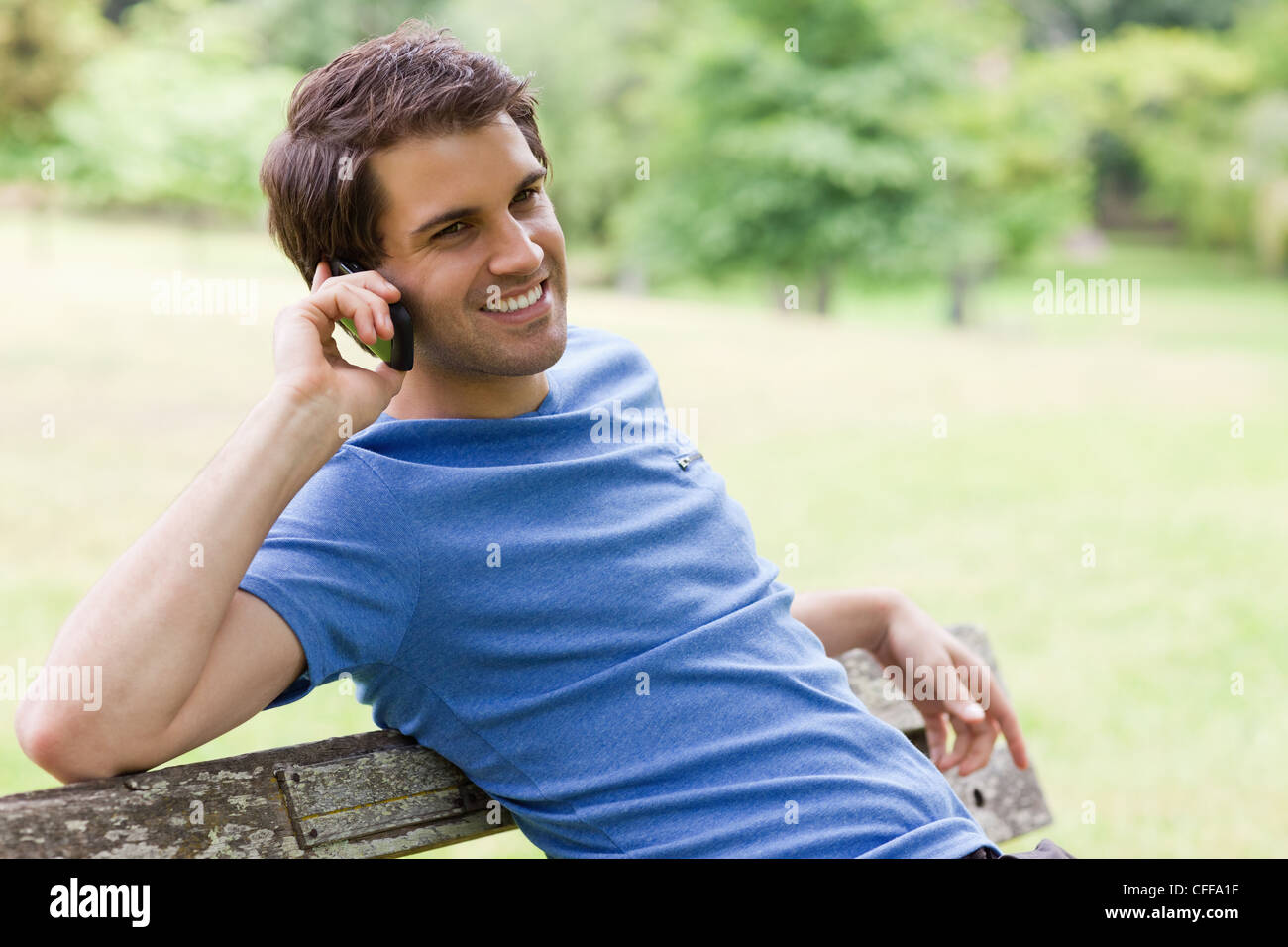 Relaxed man sitting hi-res stock photography and images - Alamy