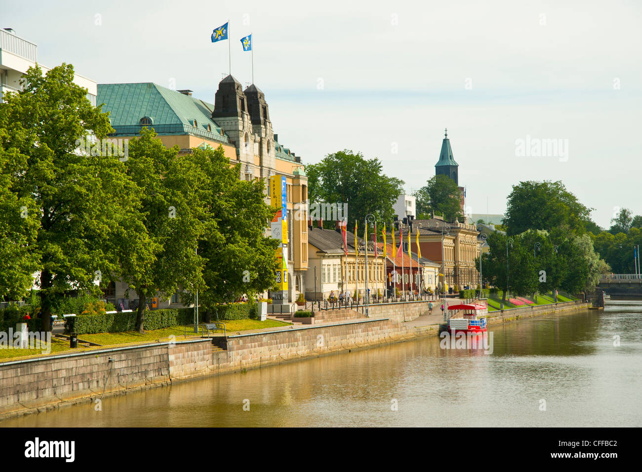 The river Aura (Aurajoki), Turku Finland with the Town Hall on left and Cathedral spire on the skyline Stock Photo