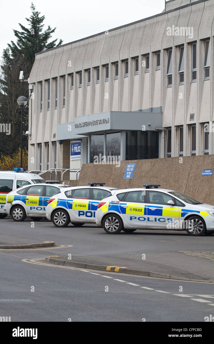 Police station and vehicles Stock Photo