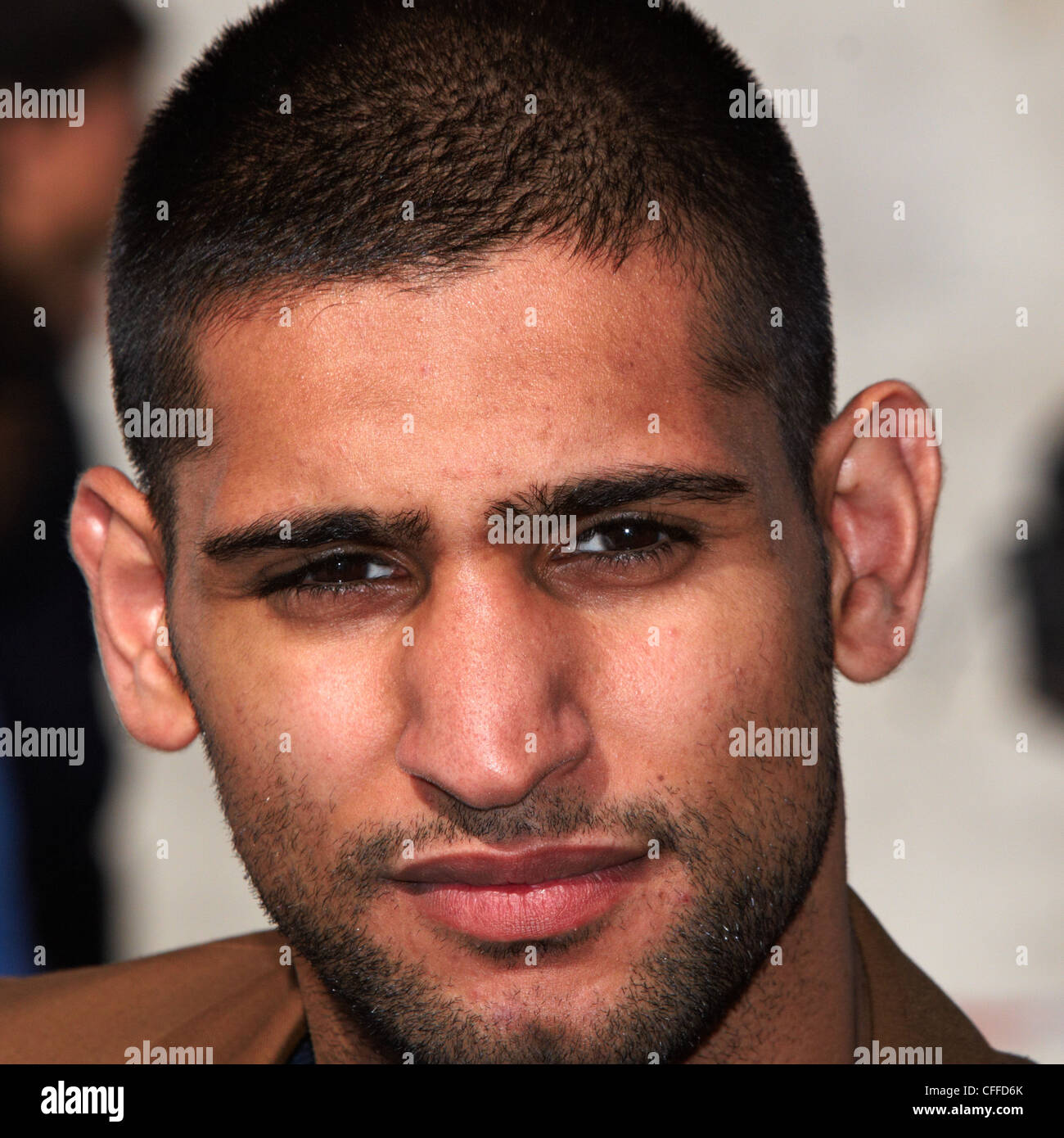 Boxer Amir Khan poses with a sculpture installed in Trafalgar Square as part of Non Violence Project's Knot Violence campaign Stock Photo