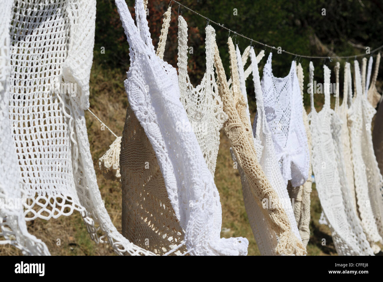 Crochet vests out to dry Stock Photo