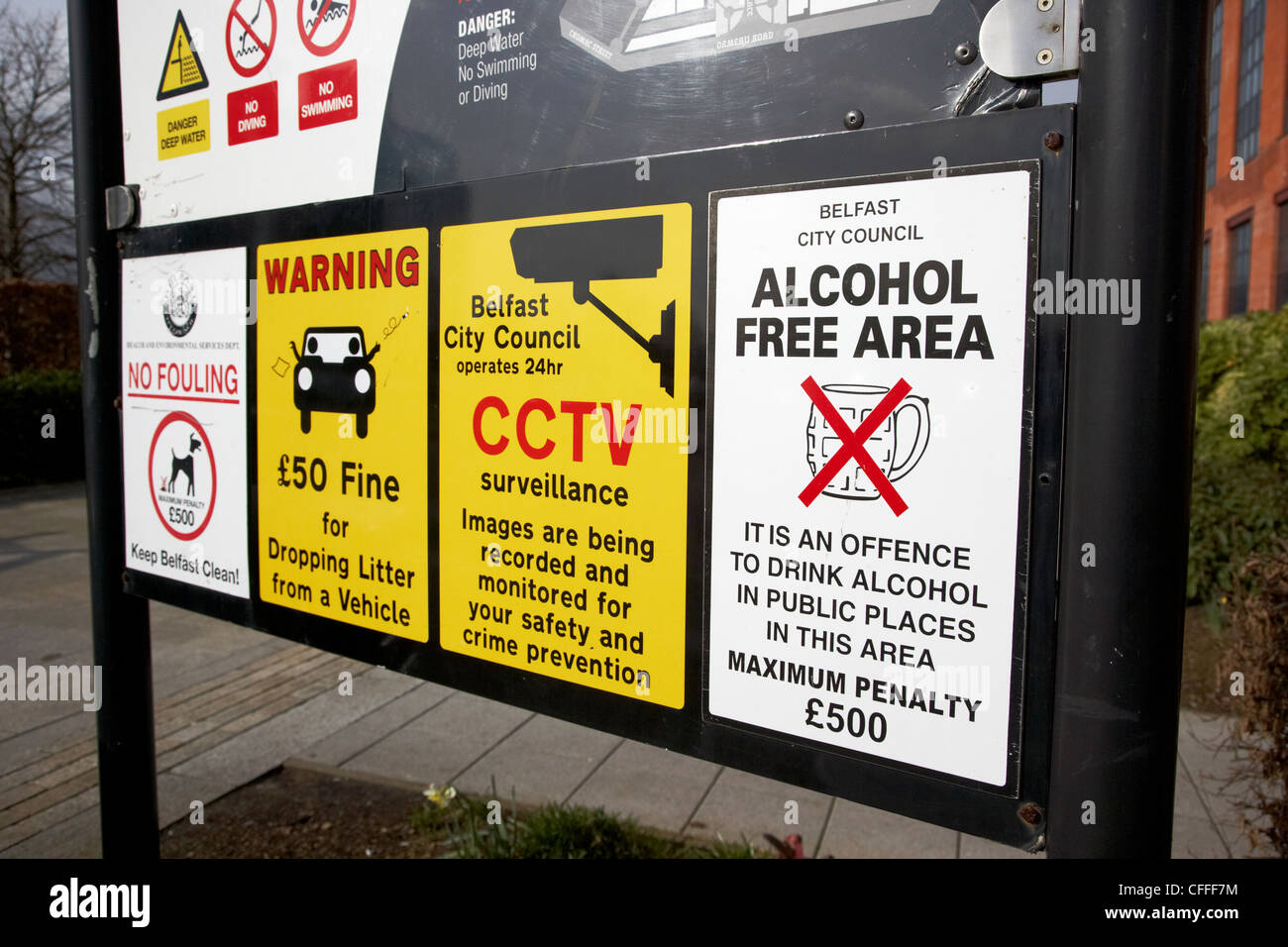 many public notice bylaws and health and safety notices on a sign in the uk Stock Photo