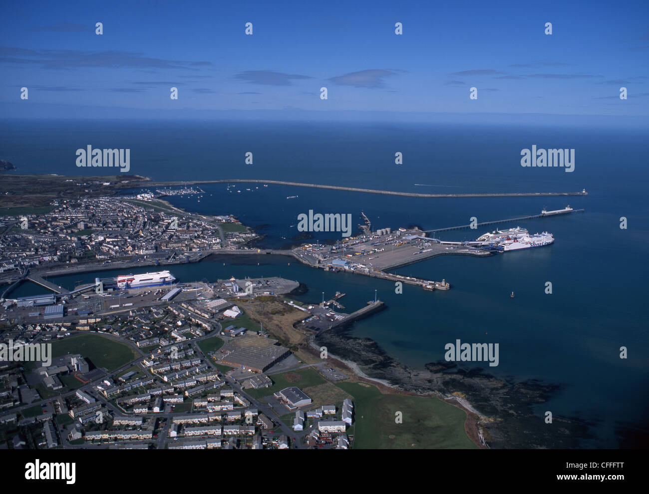 Aerial view of Holyhead Port with ferries berthed and Breakwater at top of frame Anglesey North Wales UK Stock Photo