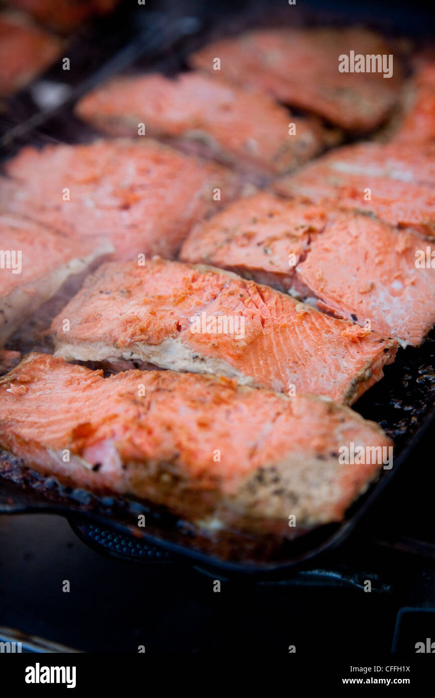 Wild salmon cooking on camp stove Stock Photo - Alamy