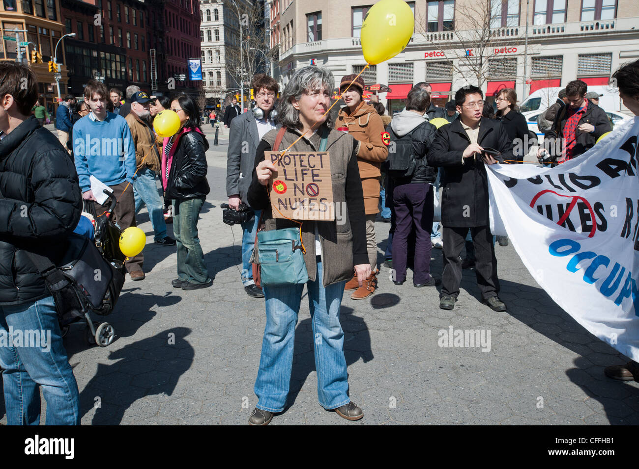 Activists in New York gather in Union Square Park to protest the use of nuclear energy Stock Photo