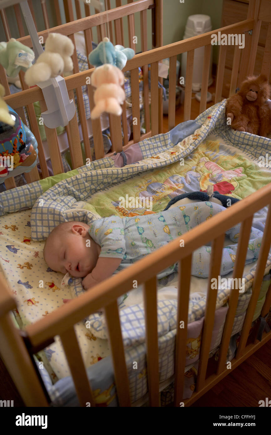 Baby Sleeping in Crib Stock Photo Alamy