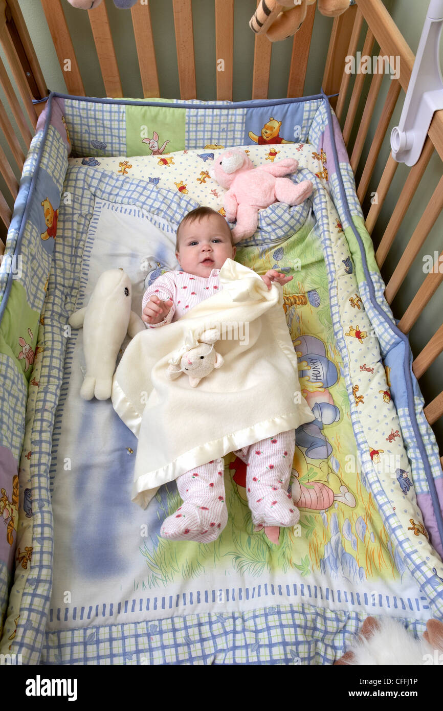 Baby Girl in Crib Stock Photo Alamy