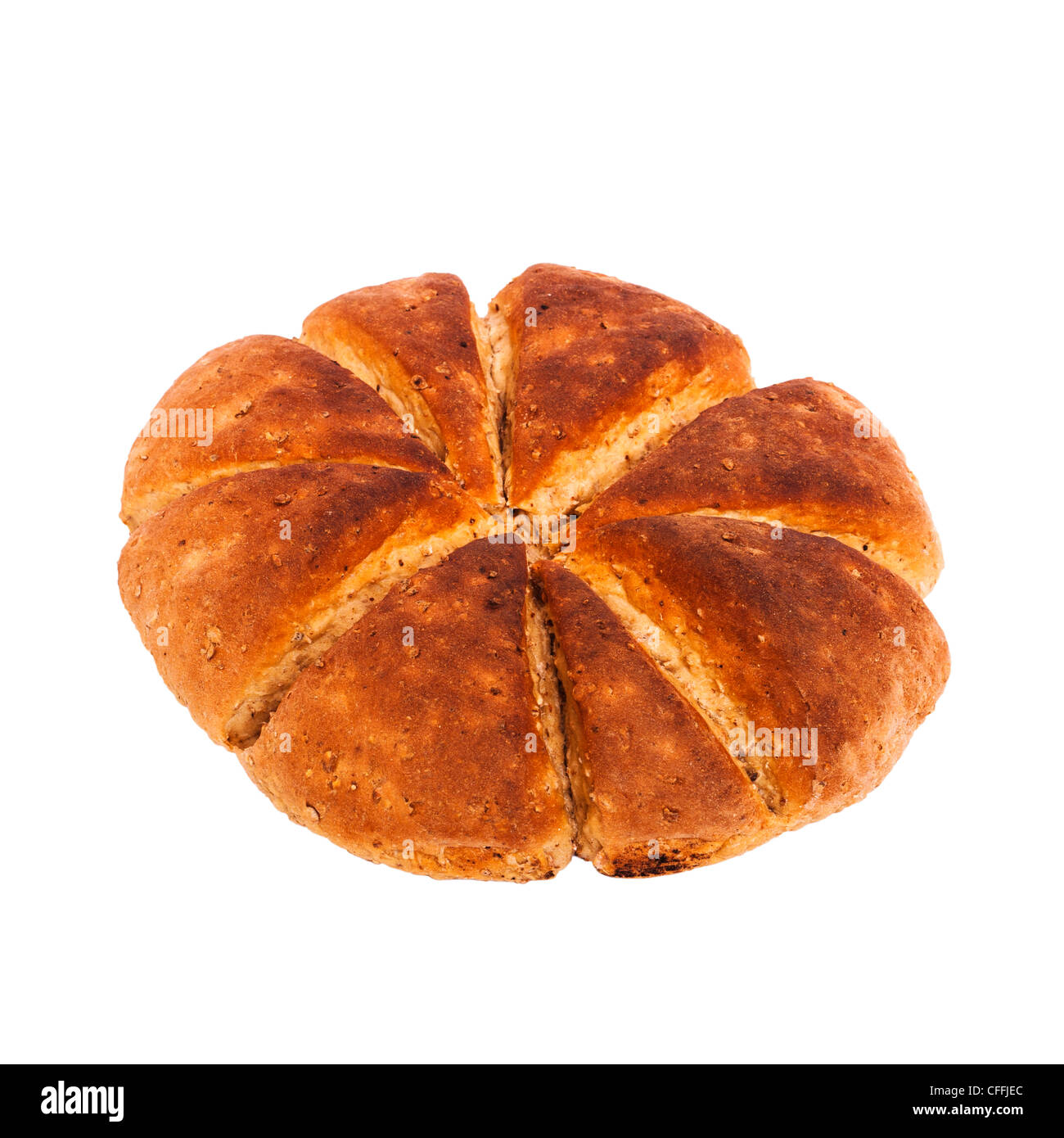 A multigrain round loaf of bread on a white background Stock Photo