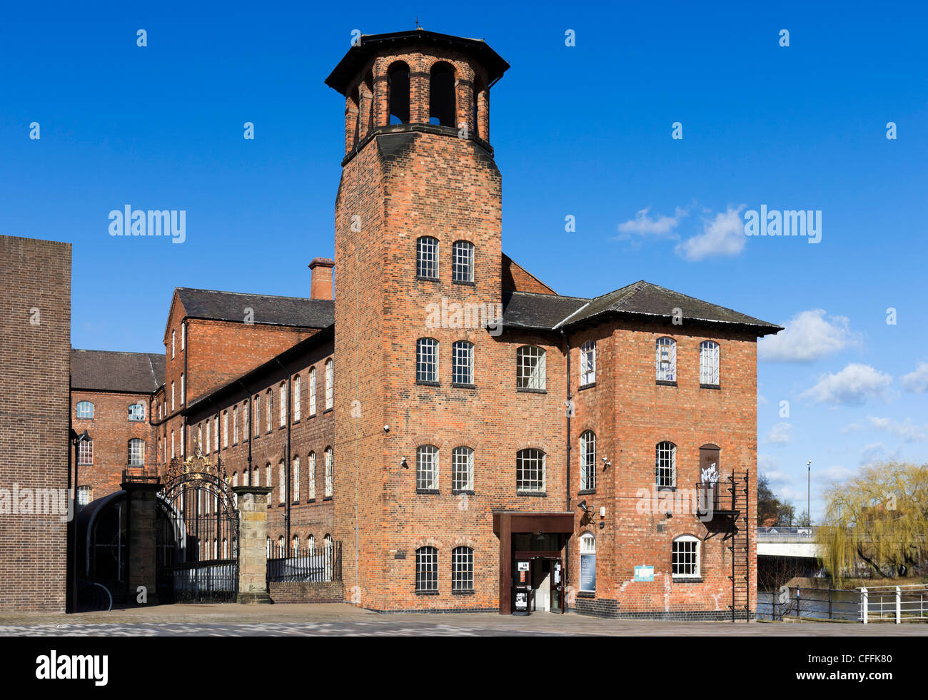 Derby Silk Mill on the banks of the River Derwent viewed from Cathedral Green, Derby, Derbyshire, East Midlands, England, UK Stock Photo