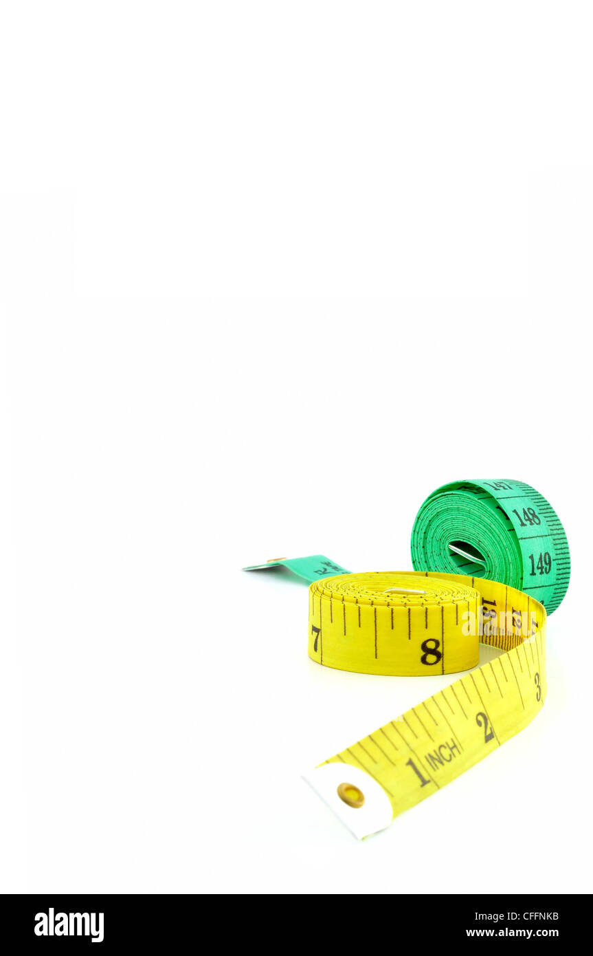 Tailors tape measure cut out against a white background. Yellow measuring  tape Stock Photo - Alamy