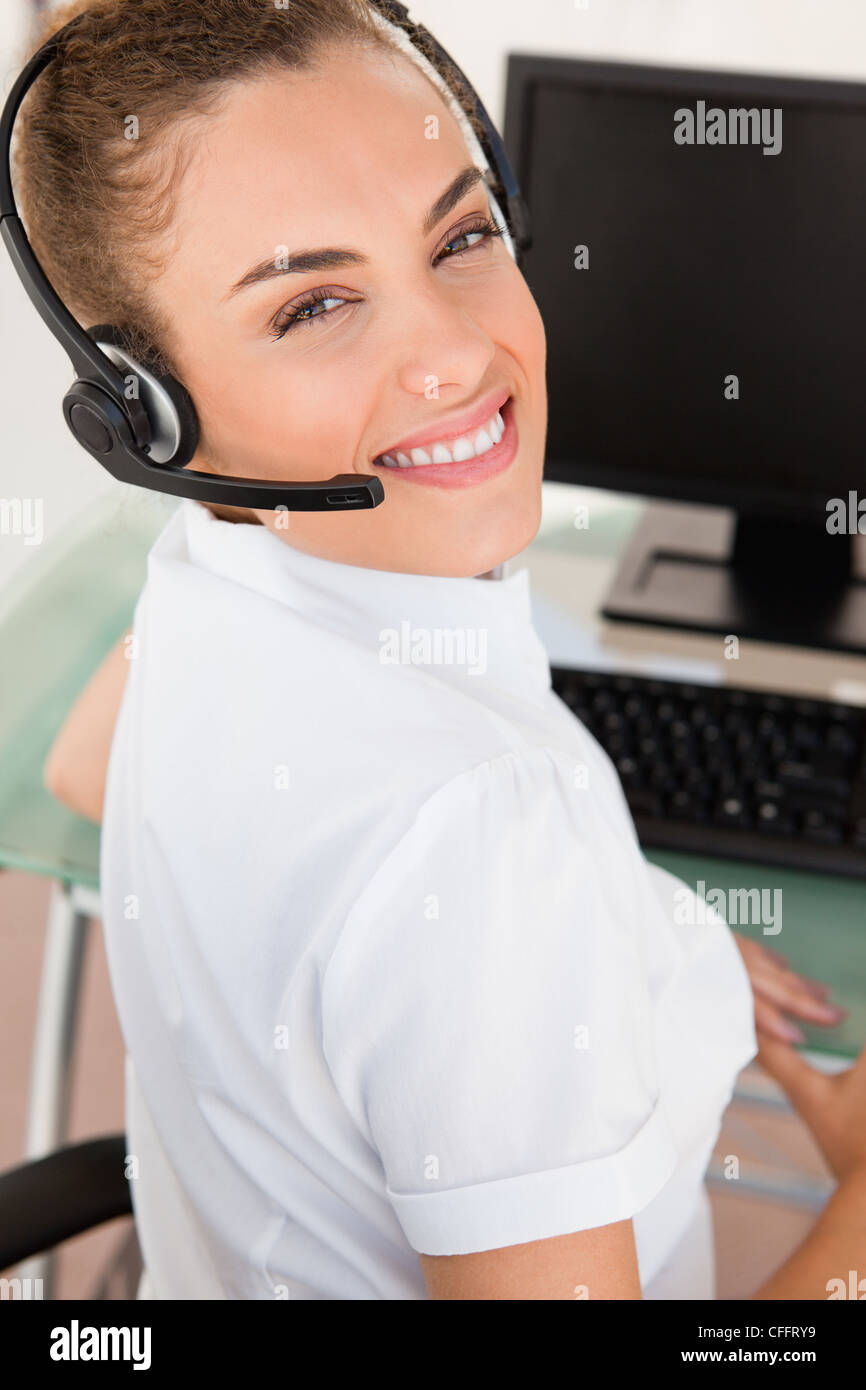 Portrait of a tanned woman wearing headphone Stock Photo