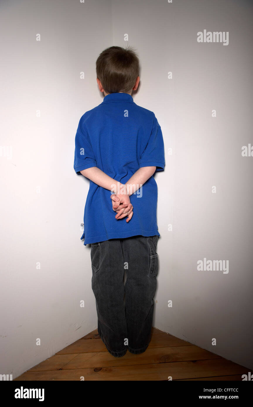 Boy Standing In Corner Stock Photos & Boy Standing In Corner Stock