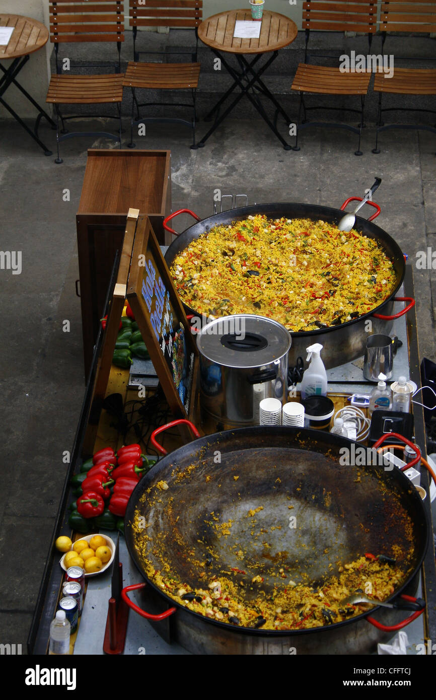 Paella cooking. Covent Garden, West End, City of Westminster, London, Greater London, England Stock Photo