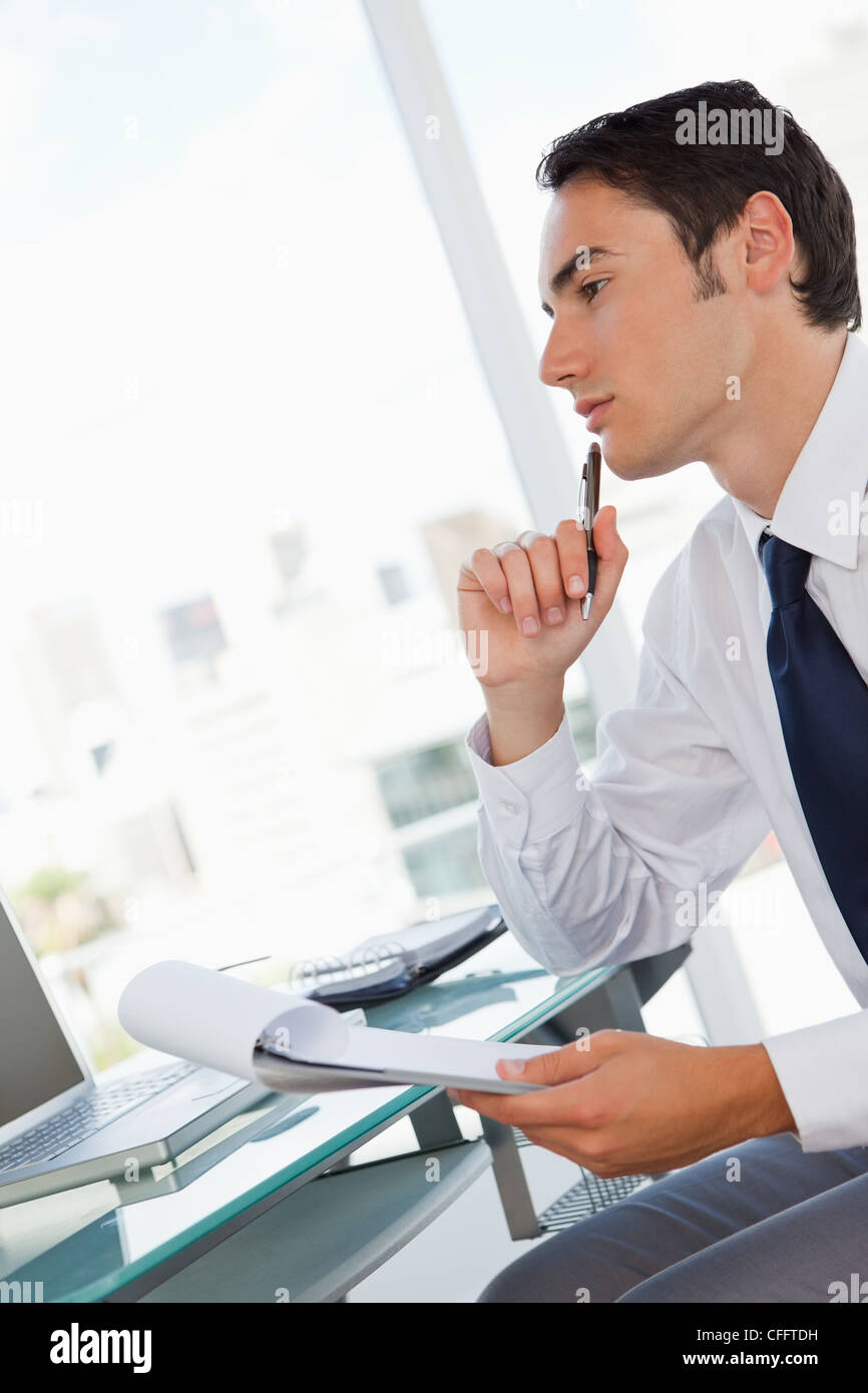 Handsome thoughtful businessman Stock Photo - Alamy