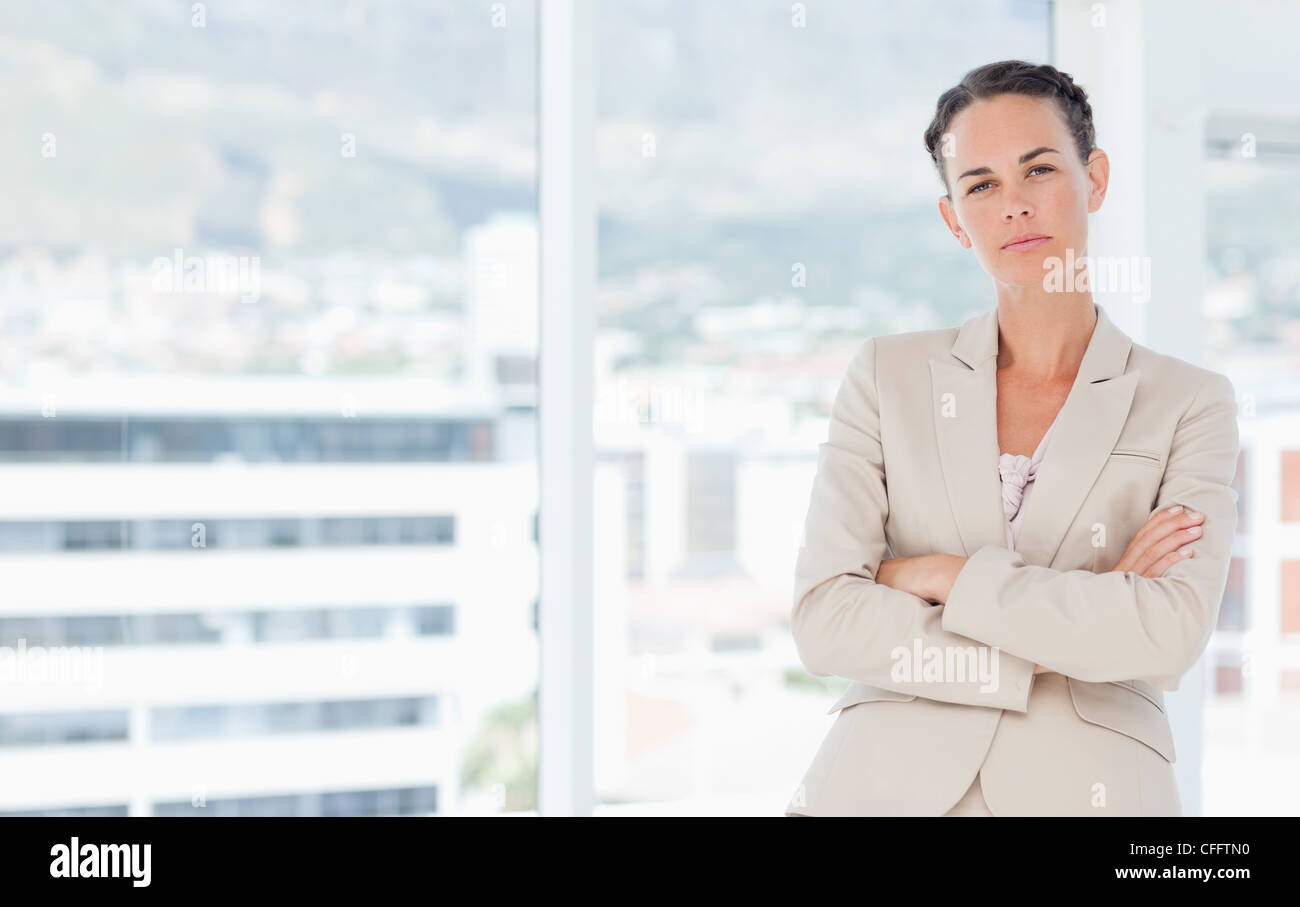 Woman standing arms folded hi-res stock photography and images - Alamy