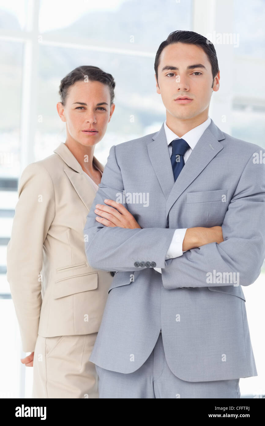 Confident businesspeople standing together Stock Photo