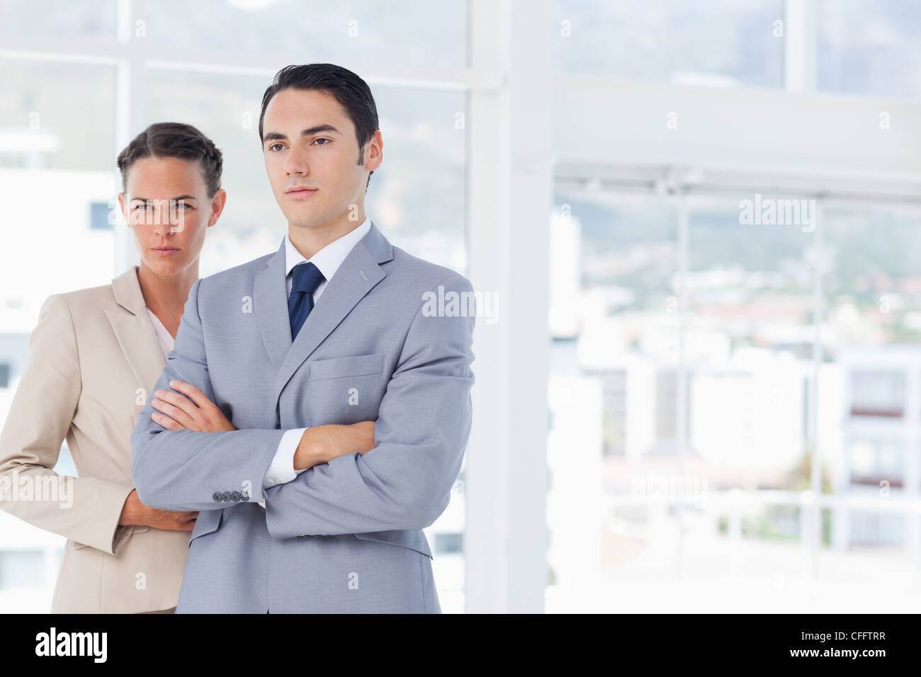 Confident businesspeople with arms crossed Stock Photo