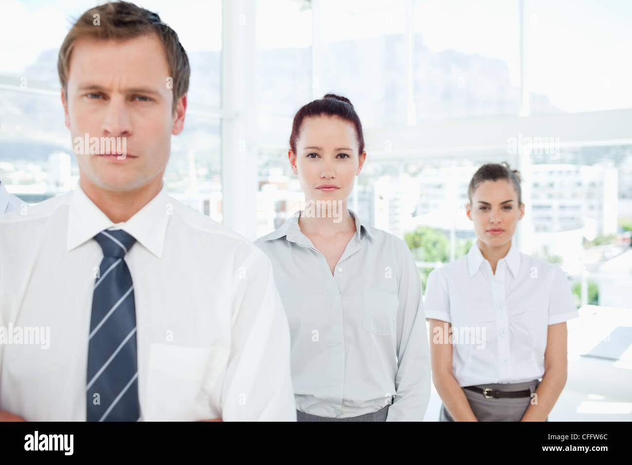 Salesteam standing in a row Stock Photo
