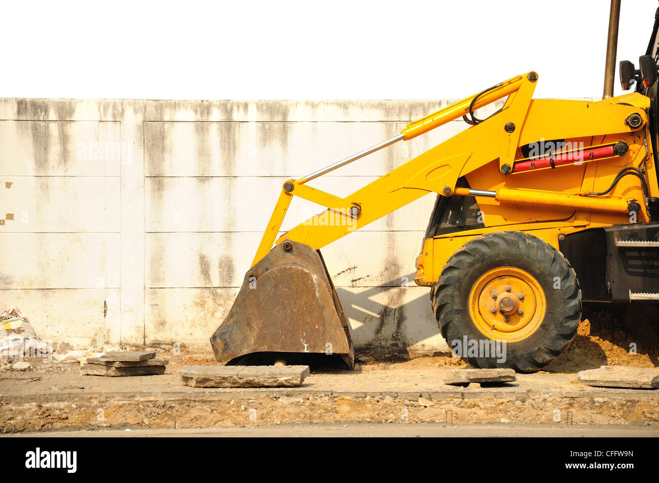 Loading Wheel Machine Wheel loader machine on the road Stock Photo - Alamy