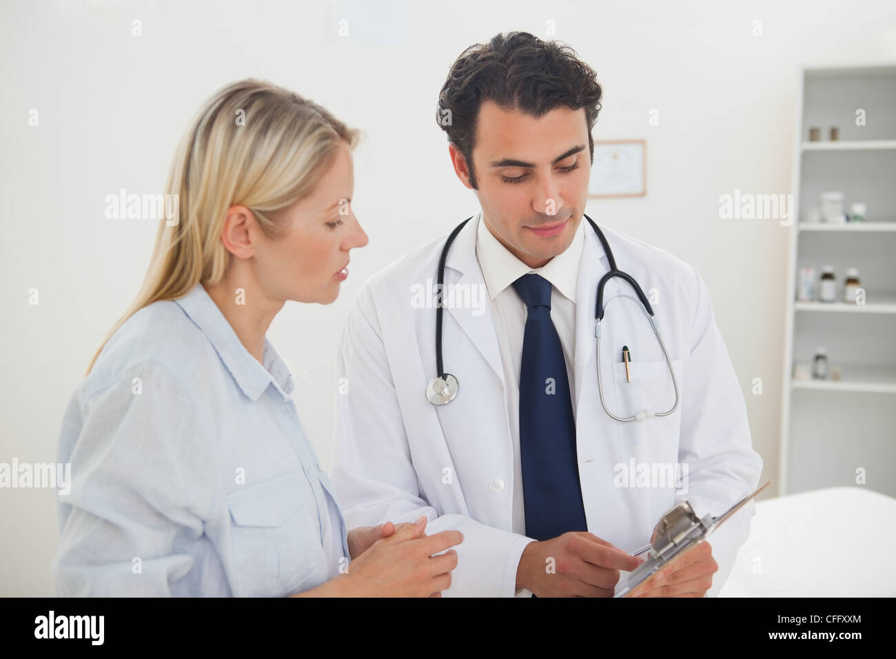 Doctor office talking patient hi-res stock photography and images - Alamy
