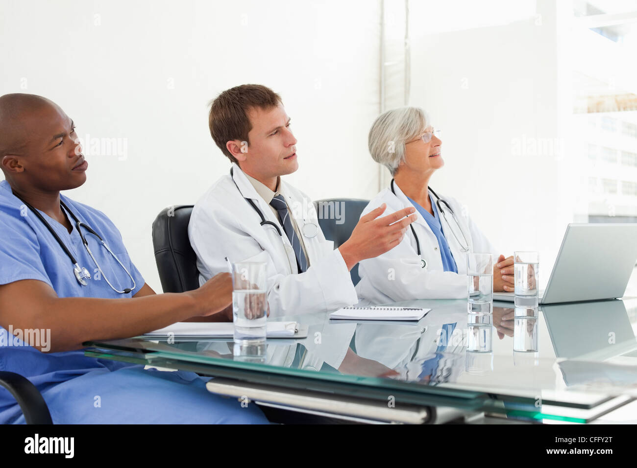 Doctors in a meeting Stock Photo