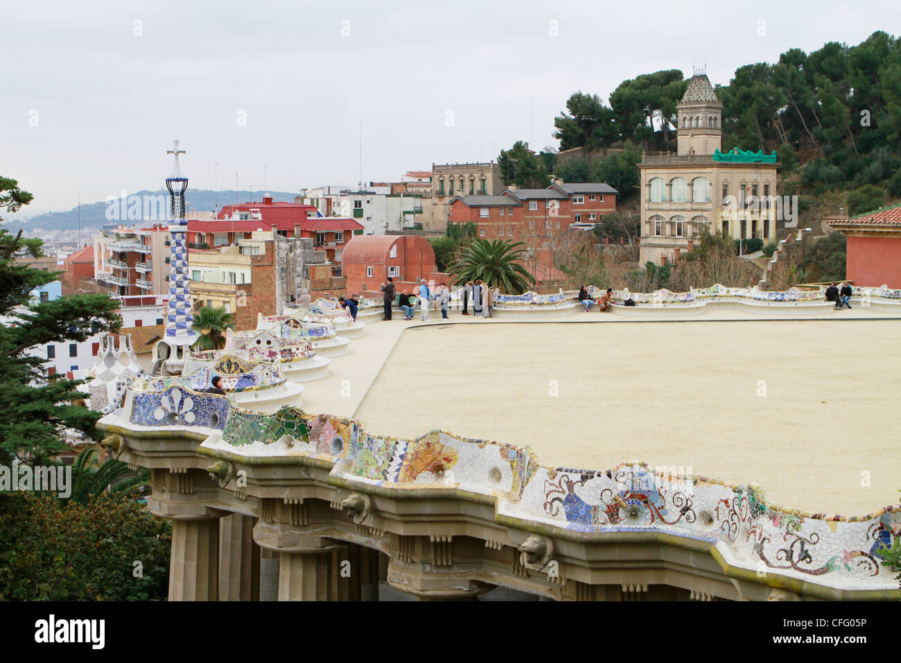 Barcelona, Spain - February 27, 2012: Tourist mill at the ornate viewing deck of Parc Guell in Barcelona (For editorial use) Stock Photo