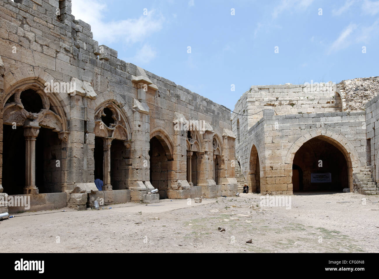 Krak des Chevaliers. Syria. The inner courtyard of the crusader castle is dominated by the striking Gothic style portico or Stock Photo