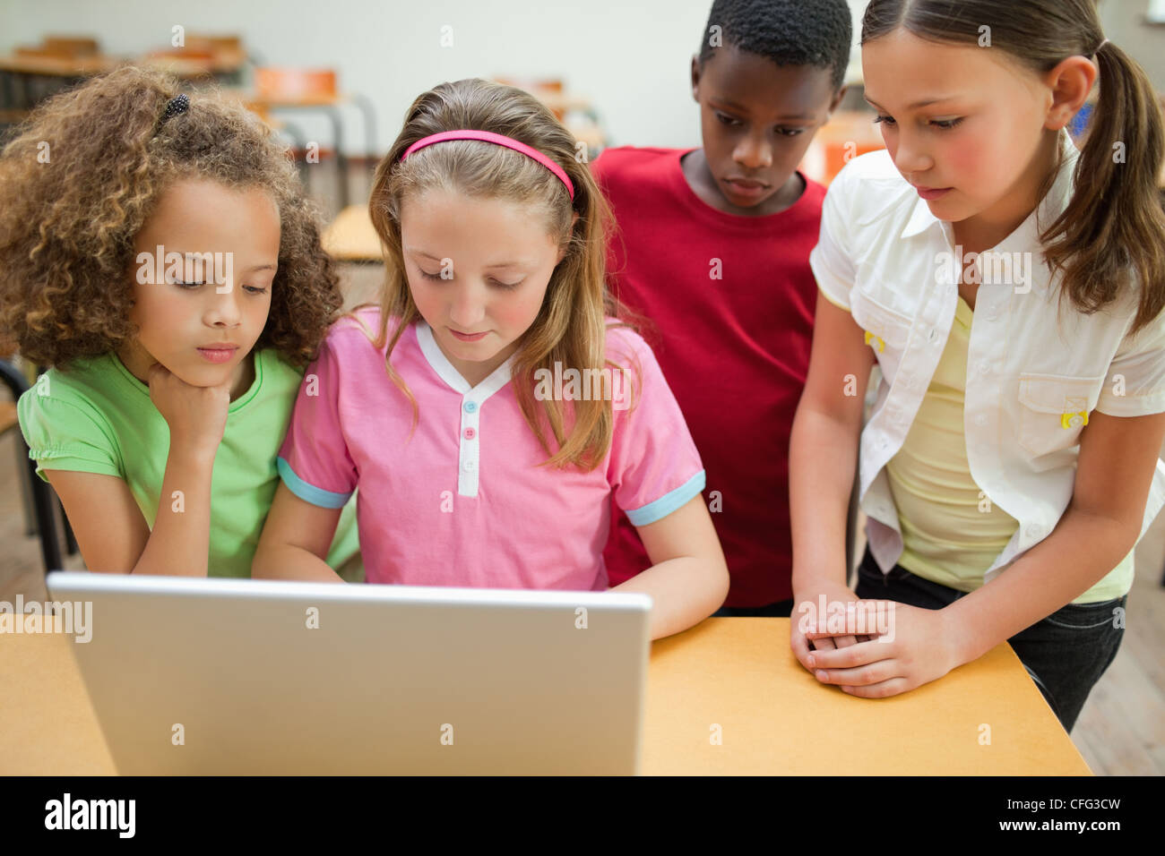 Students using notebook Stock Photo - Alamy
