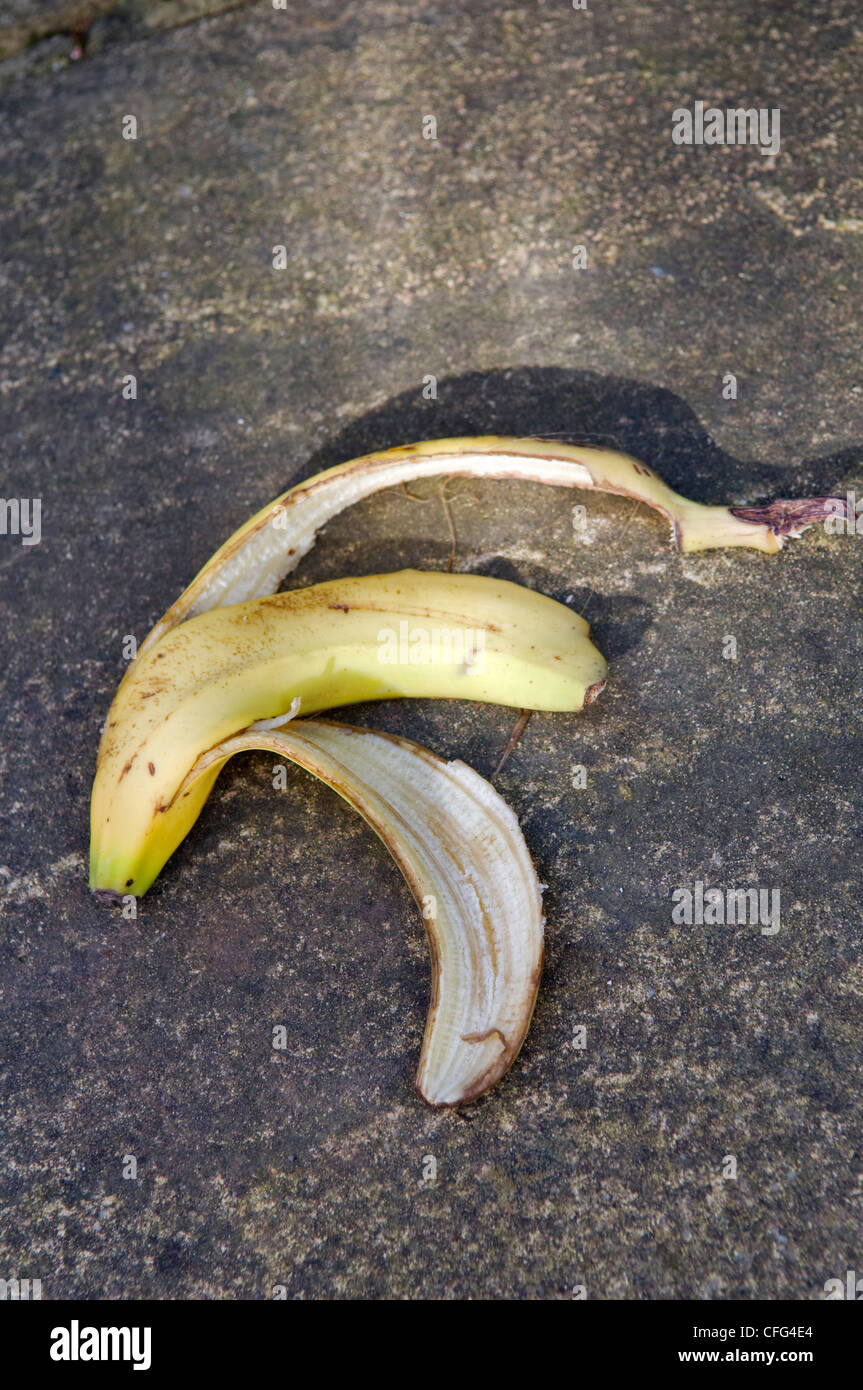 Discarded banana skin left on path taken in Bristol, United Kingdom Stock Photo
